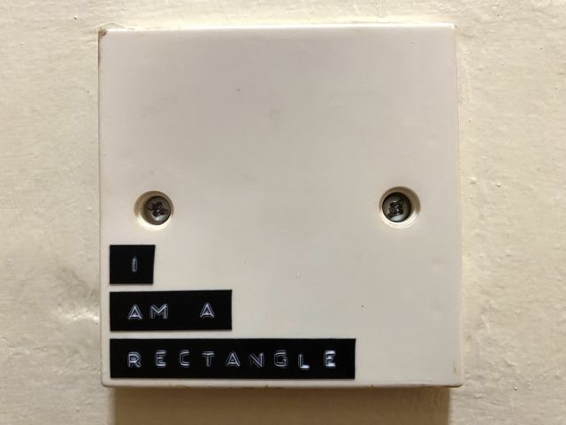 outlet cover with i am a rectangle label